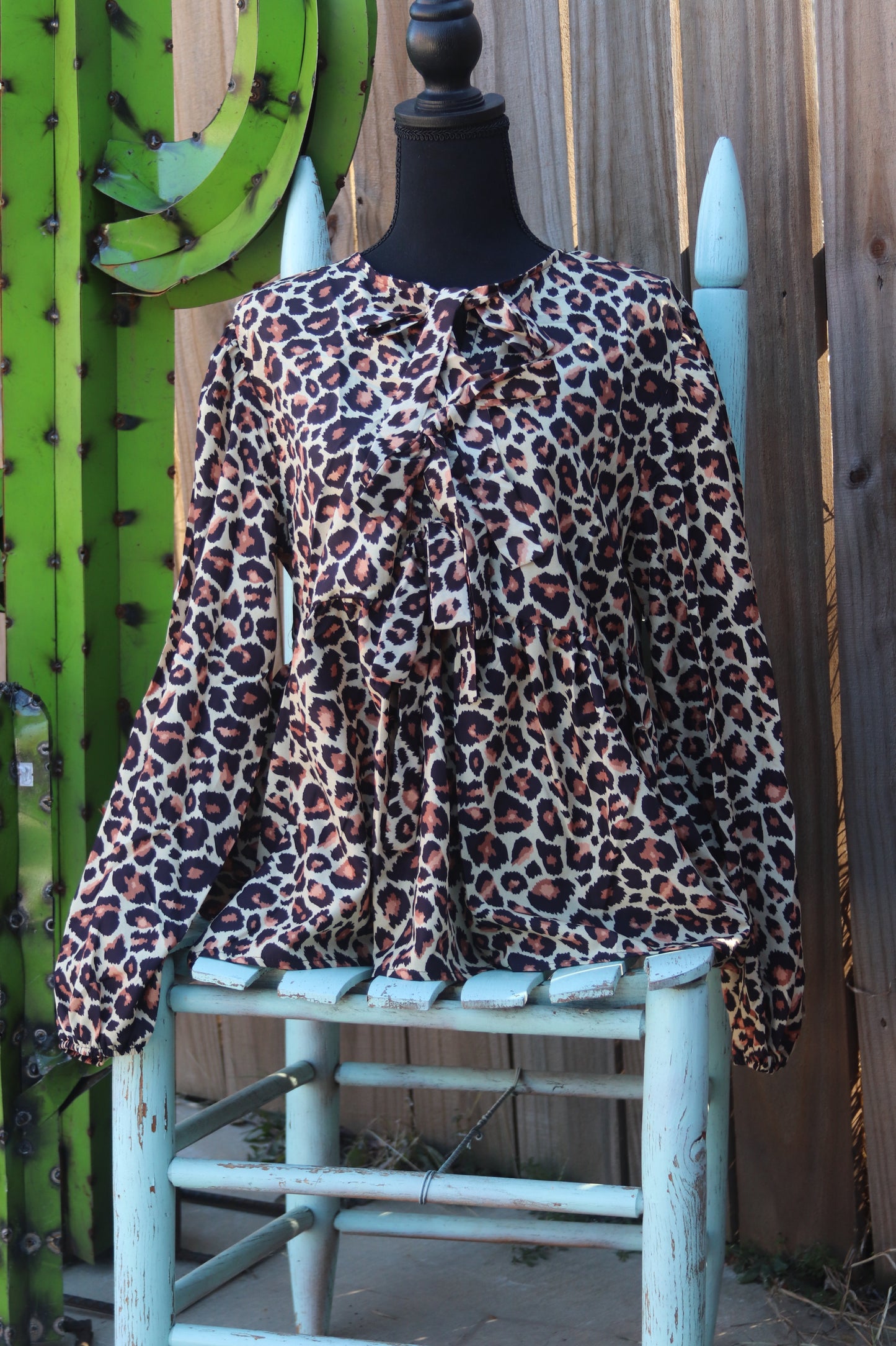 Cheetah bow blouse
