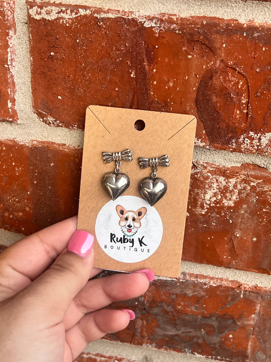 Silver bow heart earrings