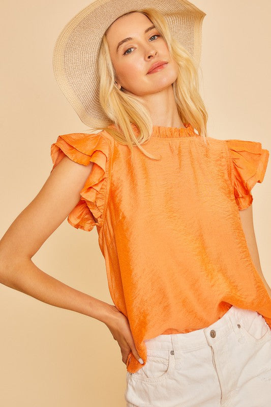 Orange ruffle top