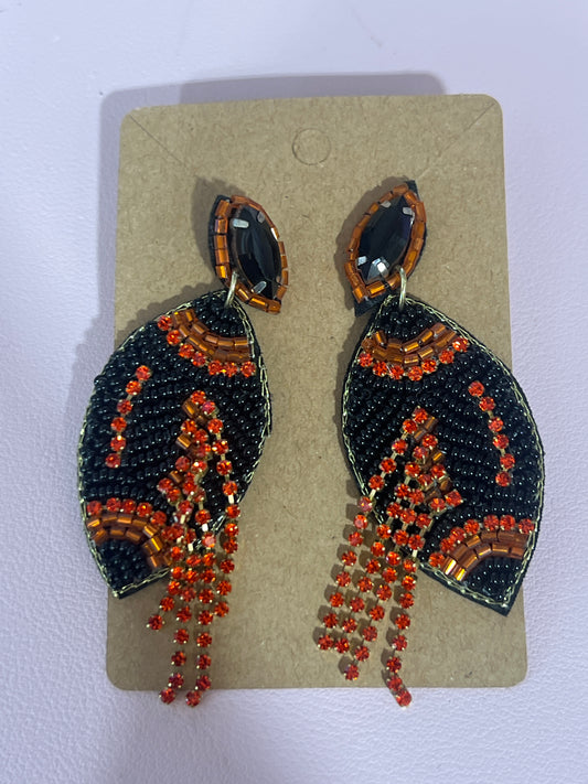 Orange and black football earrings