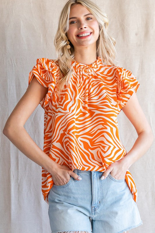 Orange zebra ruffle top